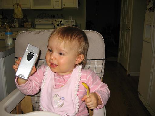 2006-11-27.portrait.baby_12_months.phone.seren-snyder.2.livonia.mi.us 