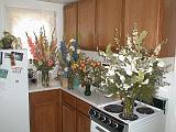 2001-08-26.wedding.kevin-nessa.engagement.flowers.kitchen.4.plymouth.mi.us.jpg