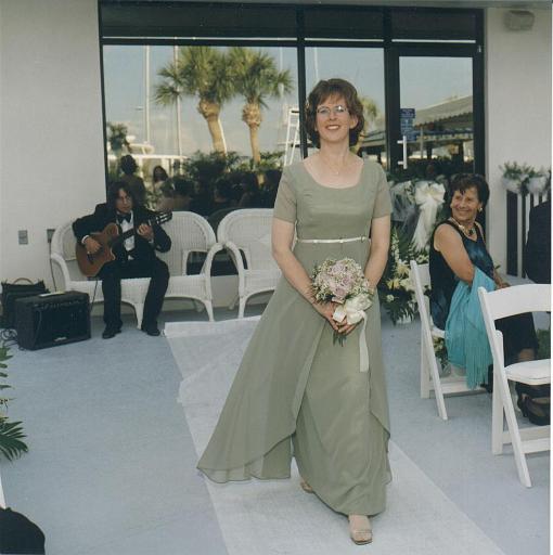 2002-05-11.wedding.kevin-nessa.procession.nancy-snyder.guitar.dancing_queen.fav.venice.fl.us 