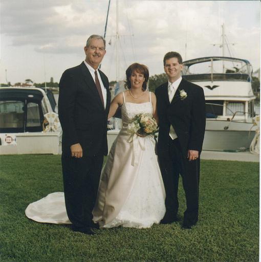 2002-05-11.wedding.kevin-nessa.after.kevin-nessa-snyder-pastor_bill.1.fav.venice.fl.us 