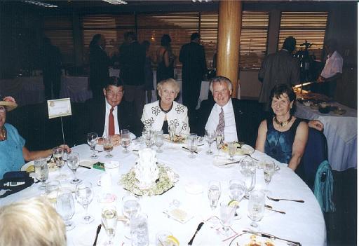 2002-05-11.wedding.kevin-nessa.reception.lowe_guests.01.candle.venice.fl.us 