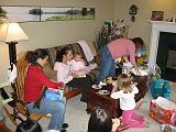 2006-11-19.seren.1yr_birthday.opening_presents.6.nessa-seren-snyder.livonia.mi.us.jpg