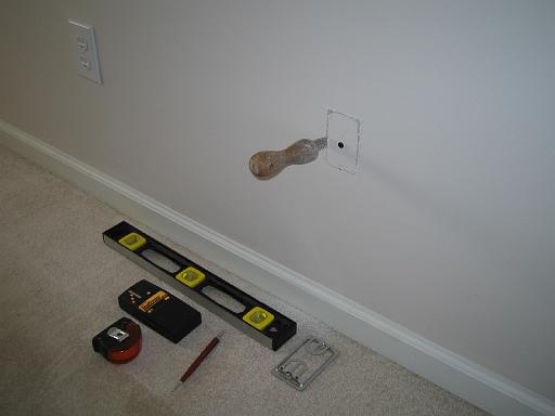 2006-01-16.adding.phone.catv.lan.wall_outlet.1.screw.hold.start.hand_saw.livonia.mi.us 