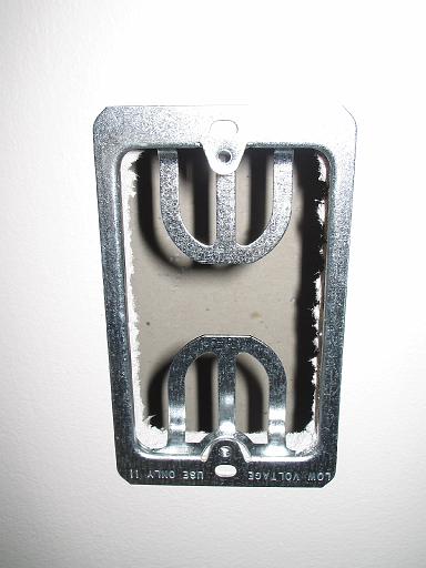 2006-01-16.adding.phone.catv.lan.wall_outlet.5.attach.hanger.bend.tabs.secure.livonia.mi.us 