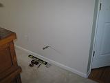 2006-01-16.adding.phone.catv.lan.wall_outlet.2.screw.hold.start.hand_saw.livonia.mi.us.jpg