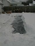 1999-01-04.pond.snow_covered.snow_half_shoveled.4.redford.mi.us