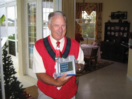 2004-12-25.opening_presents.arthur.2.christmas.venice.fl.us 