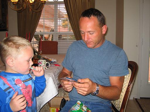 2004-12-25.opening_presents.ethan-dom.2.christmas.venice.fl.us 