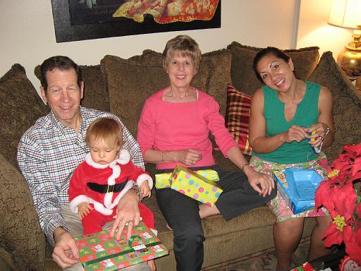 2006-12-25.opening_presents.wendy-sandy-fran-seren-snyder.1.christmas.venice.fl.us 