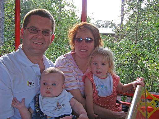 2007-12-23.train_ride.03.kevin-nessa-seren-ronan-snyder.magic_kingdom.disney.orlando.fl.us 