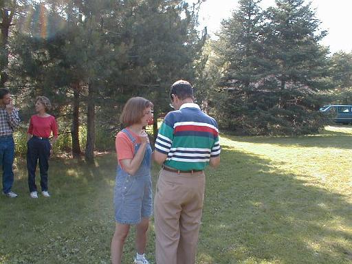 1999-08-24.snyder_family.annual.portrait_preparations.3.lake_cabin.cook.mn.us 
