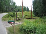 2005-08-18.signs.raps_road.3a.driveway.entrance.lake_cabin.cook.mn.us.jpg